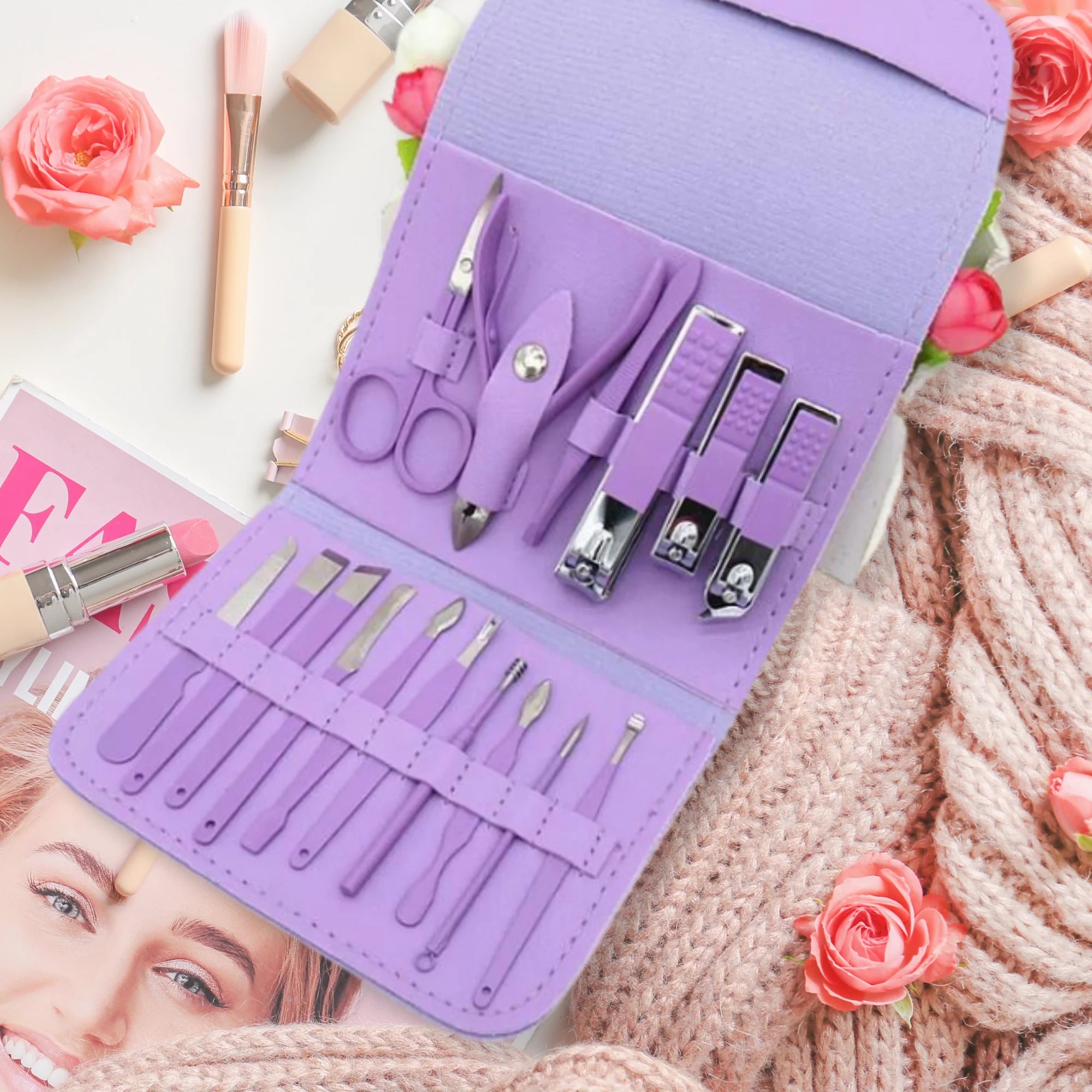 16-piece manicure and pedicure grooming kit in purple with nail care tools and a compact carrying case.