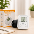 Electronic arm blood pressure monitor with digital LCD display and adjustable arm cuff